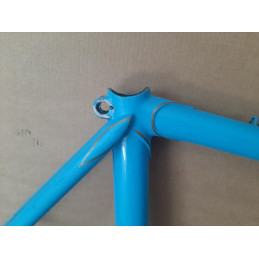 Non-original paint finish close-up on steel tubing