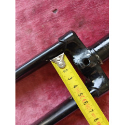 Detailed view of the left fork leg caliper mounting area