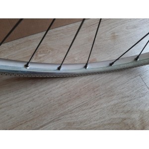 Outer steel rim surface showing minor oxidation marks