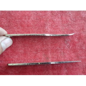 Set di due levacopertoni vintage DI NOS - particolare del marchio