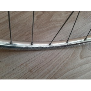 Axle locknut configuration on vintage Rigida front wheel