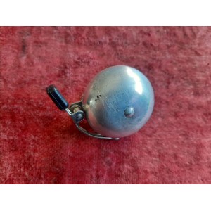 Striker mechanism of the German aluminium bicycle bell showing retro mechanical design.