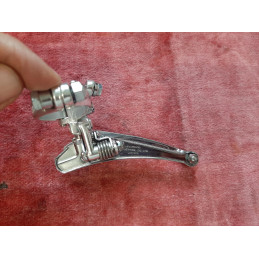 Muelle de retorno y articulación superior del desviador delantero